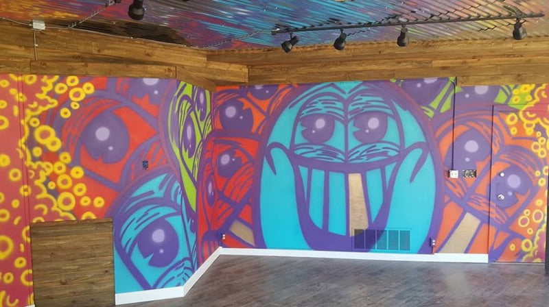 Skyblue Artist Ethan Rivelle Creates Motion Boardshop Mural