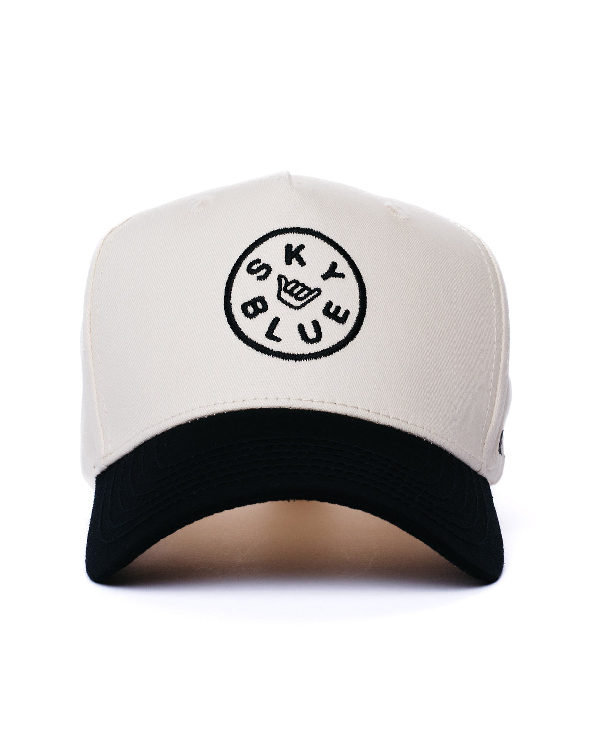 Cream and black Skyblue snapback with shaka badge