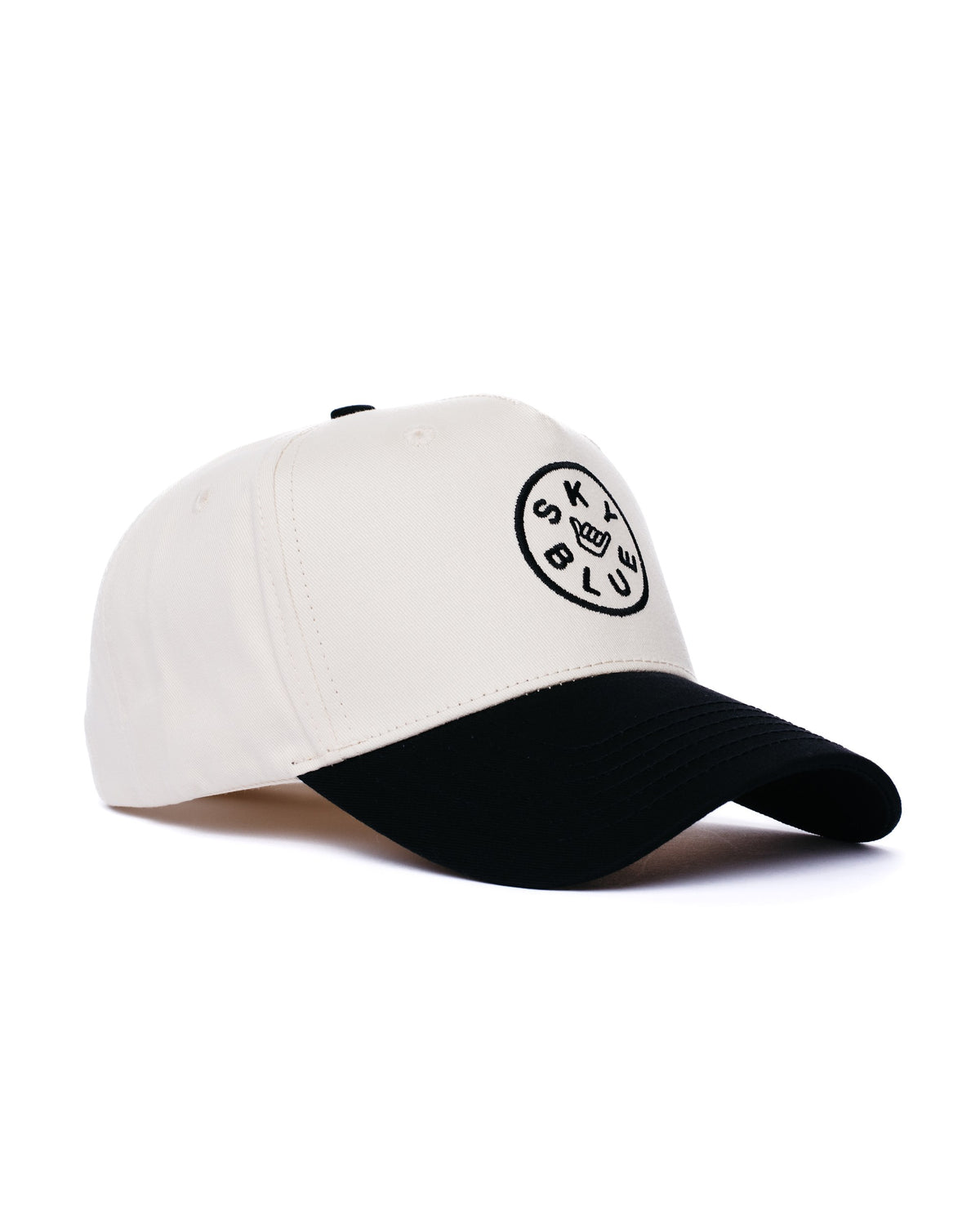 Cream and black Skyblue snapback with shaka badge